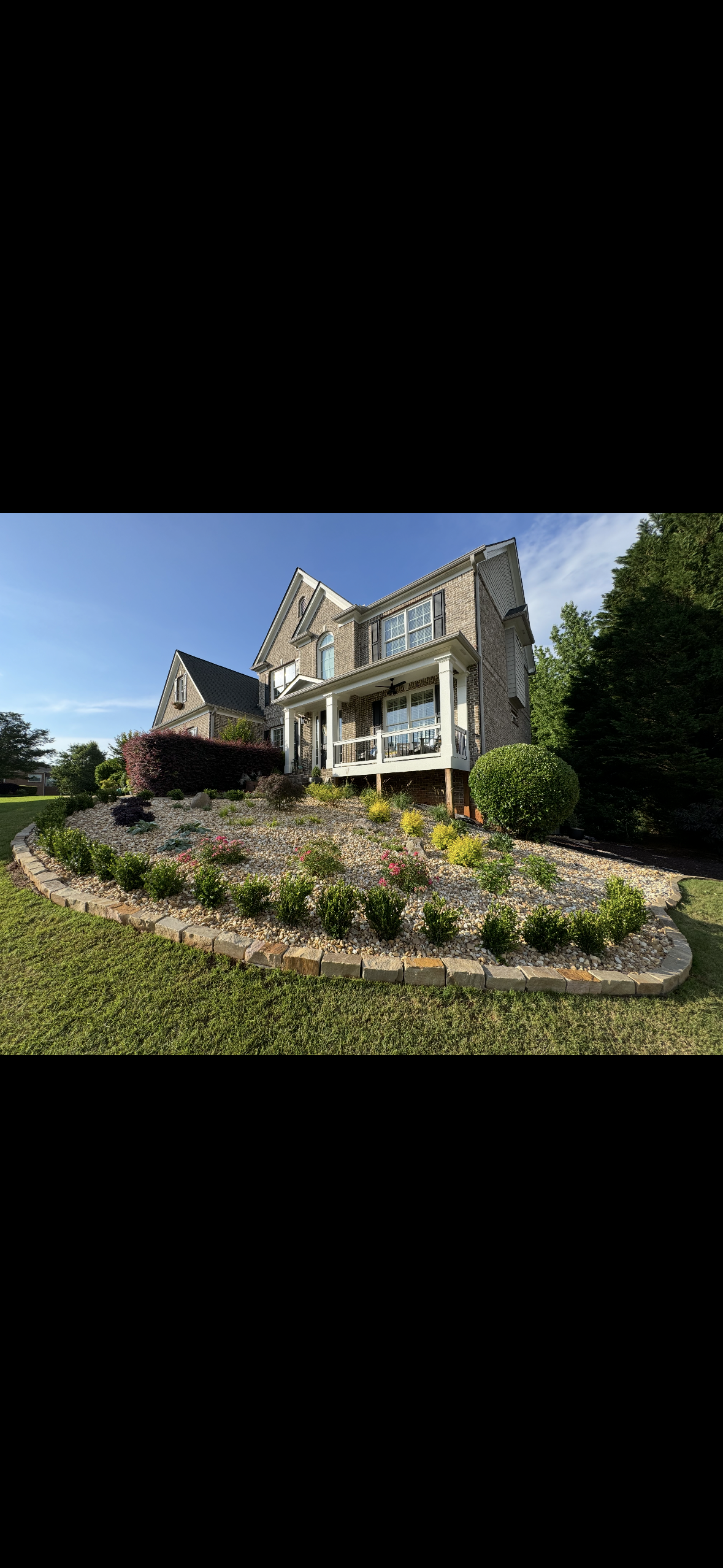 Pulse Landscaping after — second property transformed with flowering garden beds and lush lawn